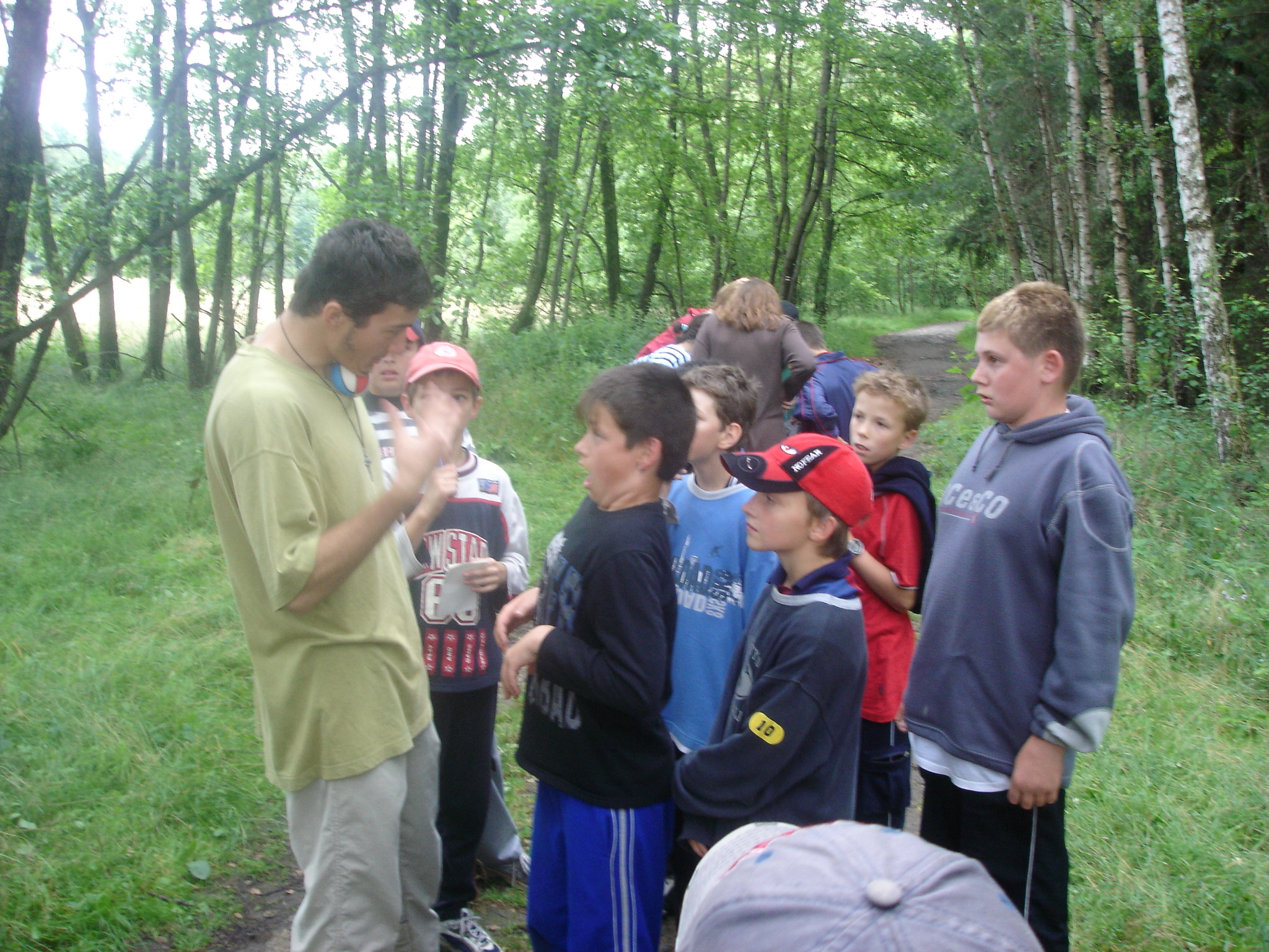 Leading a group of children through the forest at a Czech summer camp, two years later